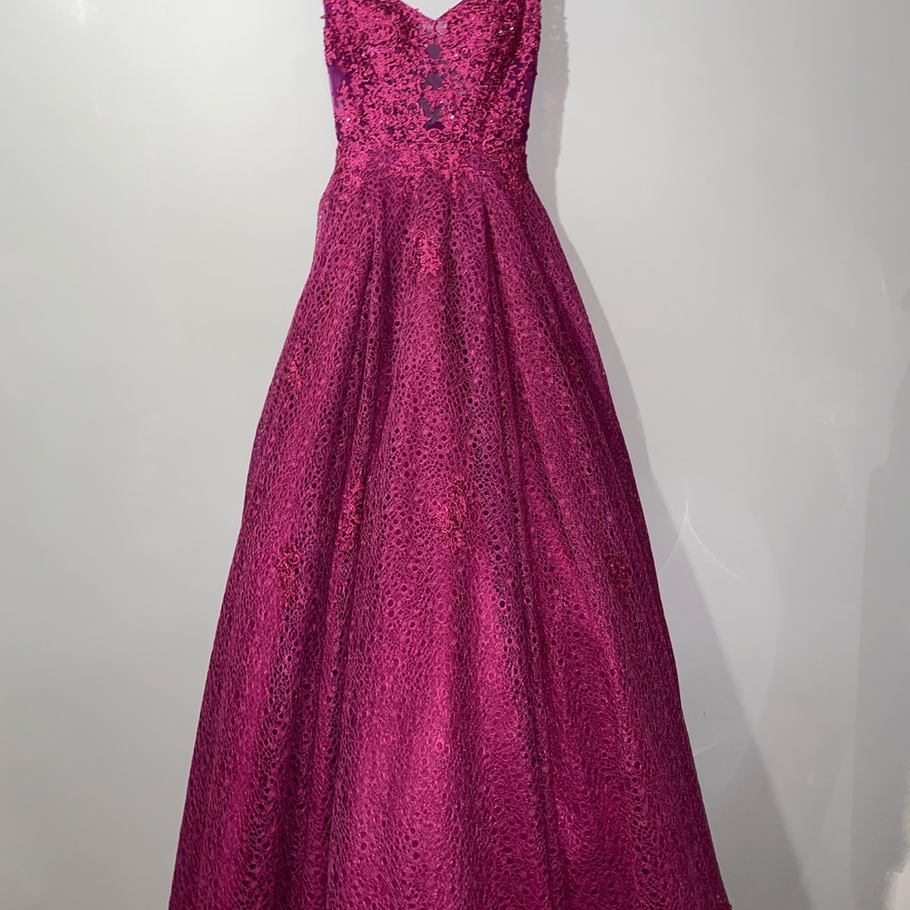 Jovani size 2 prom dress. Color is magenta. Smoke free home.